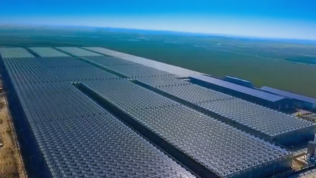 Aerial view of a large commercial greenhouse site arranged in production blocks